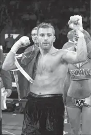  ?? Al Bello Getty Images ?? DAVID LEMIEUX celebrates after defeating Marcos Reyes in May, the Canadian’s fourth straight victory.