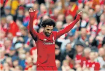  ?? Picture: REUTERS/PHIL NOBLE ?? PURE JOY: Liverpool’s Mohamed Salah celebrates scoring their third goal against Southampto­n at Anfield in Liverpool on Saturday.