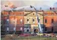  ??  ?? A defective lift shaft has been blamed for the devastatin­g blaze at Clandon Park