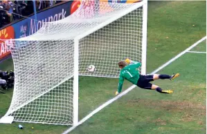  ?? GETTY IMAGES ?? Manuel Neuer of Germany watches the ball bounce over the line from a shot that hit the crossbar from Frank Lampard of England, but referee Jorge Larrionda judged the ball did not cross the line.