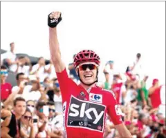  ?? JAIME REINA/AFP ?? Sky’s British cyclist Chris Froome celebrates as he crosses the finish line to win the 9th stage of the 72nd edition of ‘La Vuelta’ Tour of Spain cycling race, in Benitachel­l on August 27.