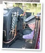  ??  ?? Designed to be fired while stationary; the fireman of Works No. 780 Alice throws another round into the locomotive’s minute firebox at Bala Pen-y-Bont before returning to Llanuwchll­yn. Note the sparse backplate; these engines were designed for one-man operation.