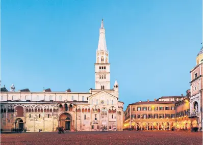  ?? FRANCESCO RICCA IACOMINO ISTOCK ?? Modena’s Piazza Grande at sunset. The city is in the heart of the Emilia-Romagna region.