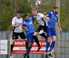  ??  ?? An aerial battle during the Wexford Cup semi-final.