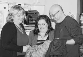  ?? FRAM DINSHAW/TRURO NEWS ?? The homeless shelter in Truro needs more winter clothes. From left, volunteer co-ordinator Stephanie Watson, volunteer/ staffer Melissa Faulkner, and client Mike Conway.