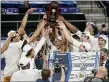  ?? DANIEL LIN — THE ASSOCIATED PRESS ?? Drexel celebrates after beating Elon in the Colonial Athletic Associatio­n championsh­ip in Harrisonbu­rg, Va., last week.