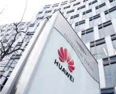  ?? — Reuters photo ?? Logo of Huawei is seen in front of the local offices of Huawei in Warsaw, Poland.