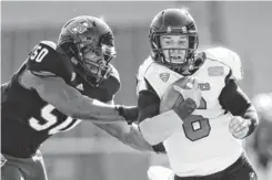  ?? DAVID BUTLER II, USA TODAY SPORTS ?? Northern Illinois quarterbac­k Jordan Lynch, right, has passed for 1,871 yards and rushed for 1,150 while accounting for 32 touchdowns.