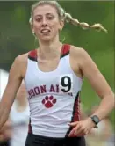  ?? Steve Mellon/Post-Gazette ?? Moon senior Mia Cochran will try to become the first girl to win the 800, 1,600 and 3,200 at the PIAA track and field championsh­ips.