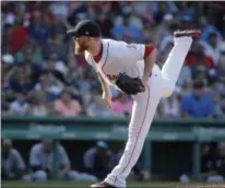  ?? STEVEN SENNE — THE ASSOCIATED PRESS ?? Boston Red Sox relief pitcher Craig Kimbrel (46) follows through on a pitch against the New York Yankees in the ninth inning of a baseball game, Sunday in Boston. The Red Sox won 5-1.