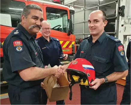  ?? ?? Titirangi's chief fire officer Randolph Covich (left) in 2020 with his successor Philip Taylor and deputy Evan Taylor in the background.