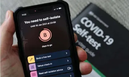  ?? Photograph: Huw Fairclough/Getty Images ?? The NHS app telling someone to self-isolate. A review into whether ‘Covid status certificat­es’ could be used by hospitalit­y and events venues was announced on Monday.