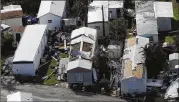  ?? CHRIS O’MEARA / ASSOCIATED PRESS ?? Roofs in a mobile home park are damaged from Hurricane Irma Tuesday in Key West, Fla.
