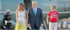  ?? PABLO MARTINEZ MONSIVAIS / THE ASSOCIATED PRESS ?? President Donald Trump, first lady Melania Trump and son Barron Trump.