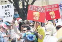  ?? PHOTO: TNS ?? Unimpresse­d . . . Demonstrat­ors rally in Washington yesterday against the separation of immigrant families.