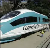  ?? RICH PEDRONCELL­I ?? FILE - This Feb. 26, 2015, photo shows a full-scale mock-up of a highspeed train, displayed at the Capitol in Sacramento, Calif.