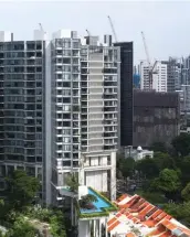  ?? PICTURES: SAMUEL ISAAC CHUA/THE EDGE SINGAPORE ?? The seller of a 1,281 sq ft unit at Helios Residences made a loss of $1.83 million when it was sold for $3.15 million on April 21