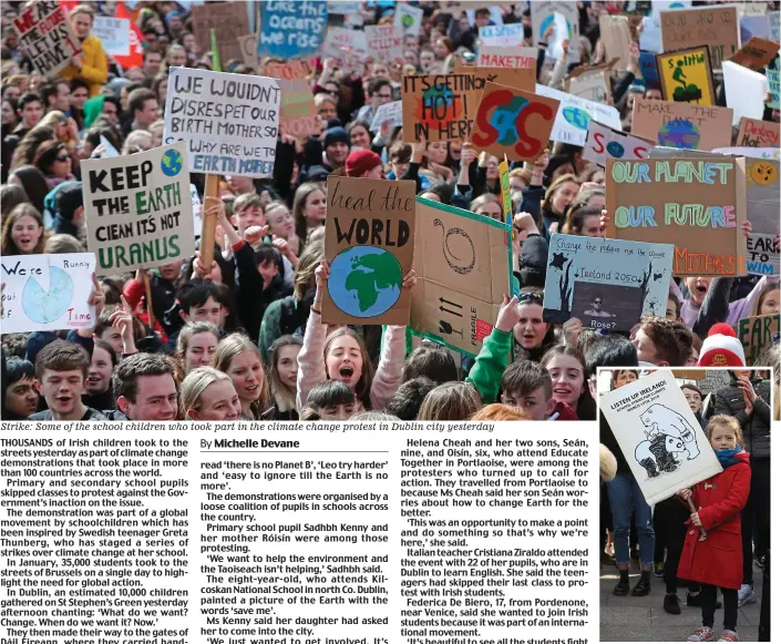  ??  ?? Strike: Some of the school children who took part in the climate change protest in Dublin city yesterday Hope: Clara Rose Holden, 8, protested