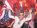  ?? ASHLEY LANDIS/AP ?? People dance during a U.S. Soccer fan party Sunday in Doha.