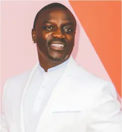 ?? WENN.COM ?? Singer Akon, who spent his early childhood in Senegal before moving to the U. S., says his proposed cutting- edge city will attract tourists and galvanize the economy by
creating thousands of jobs.