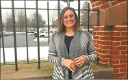  ?? Cassandra Day / Hearst Connecticu­t Media ?? Cromwell Belden Library Director Kara Canney stands in the courtyard, which will be replaced by an expansion of the facility at 39 West St. Residents overwhelmi­ngly approved the $3.66 million resolution Wednesday night. The plan also calls for...