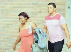  ?? PICTURE: HEIN COETZEE/ANA ?? PLEAS AND PLOTS: Councillor Magdalene Titus is escorted to the police holding cells after she was arrested.