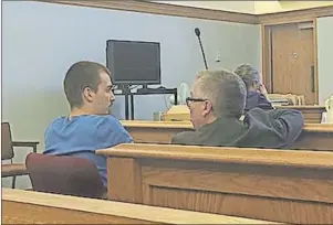  ??  ?? TC MEDIA FILE PHOTO Brandan Bungay (left) speaks with his lawyer, Desmond Parsons, in Gander provincial court in June 2015.