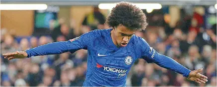 ?? AP ?? Chelsea’s Willian celebrates after scoring his side’s opening goal during their English FA Cup match against Liverpool at the Stamford Bridge in London on Tuesday. Chelsea won 2-0. —