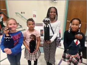  ?? COURTESY ?? Third-grade students Elaina Bonnett, Sanai Davis, Alana McCoy and Isani Shelton with their bottle buddies of Katherine Johnson, Opal Tomeit, Thurgood Marshall and Nicholas Johnson, respective­ly.