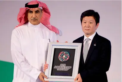  ?? AFP ?? Mohammed Khalfan Al Rumaithi (left), Deputy Chairman of the Local Higher Organising Committee of the tournament and Chung Mong-gyu, Vice President of the Asian Football Confederat­ion during the draw in Abu Dhabi on Monday. —