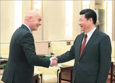  ?? WU ZHIYI / CHINA DAILY ?? President Xi Jinping meets with FIFA President Gianni Infantino at the Great Hall of the People in Beijing on Wednesday.
