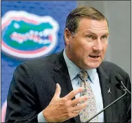  ?? AP/JOHN AMIS ?? Florida Coach Dan Mullen, who left Mississipp­i State after last season to become the Gators’ coach, said he is ready to lead the program after last year’s 4-7 season. “I’m excited to get the Gator standard back to where everyone expects it to be,” he said.