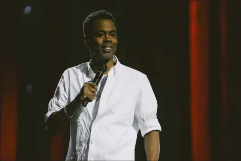  ?? KIRILL BICHUTSKY — NETFLIX VIA AP ?? Chris Rock during a performanc­e his comedy special “Chris Rock: Selective Outrage” at the Hippodrome Theater in Baltimore, Md.