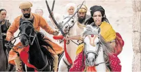  ?? Roadside Attraction­s ?? Devika Bhise, right, stars in “The Warrior Queen of Jhansi.”