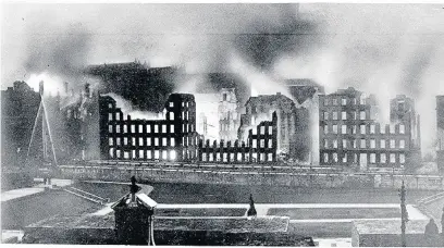  ??  ?? ●Piccadilly Plaza on fire - warehouses blaze in the December 1940 Blitz