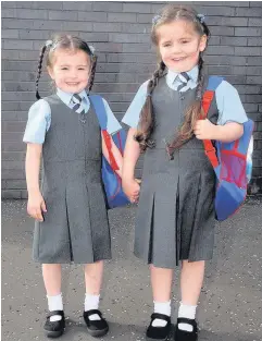  ??  ?? School days Ava and Evie Cintron of Calderwood Primary School