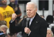  ?? Nati Harnik / Associated Press ?? While campaignin­g in Council Bluffs, Iowa, Joe Biden fended off an onslaught of GOP attacks.