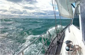  ??  ?? Left: transiting the Caledonian Canal. Right: strong winds in the Irish sea showcased Shaima’s seakindly characteri­stics