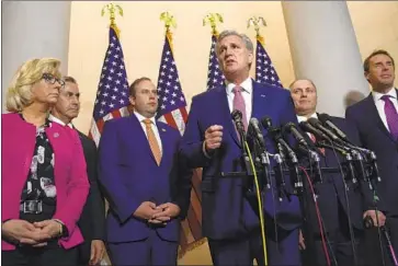  ?? Susan Walsh Associated Press ?? HOUSE Majority Leader Kevin McCarthy (R-Bakersfiel­d) speaks Wednesday to fellow Republican­s. He has had a strong relationsh­ip with President Trump — but some say that’s the wrong direction for the state party.