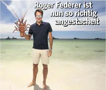  ?? GETTY ?? Die Idylle trügt: Zu Beginn des Shootings zuckte Federer vor der Languste zusammen.