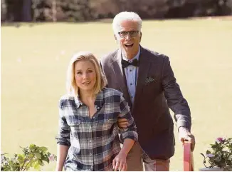  ?? NBC ?? Eleanor (Kristen Bell) wants to keep hidden the clerical error that landed her in heaven from Michael (Ted Danson) in “The Good Place,” premiering Sept. 19.