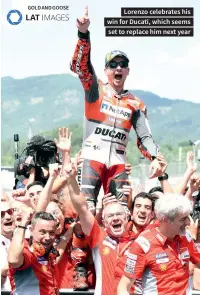  ??  ?? Lorenzo celebrates his win for Ducati, which seems set to replace him next year