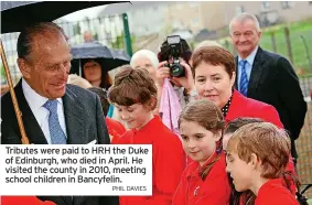  ?? PHIL DAVIES ?? Tributes were paid to HRH the Duke of Edinburgh, who died in April. He visited the county in 2010, meeting school children in Bancyfelin.