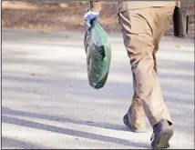  ??  ?? In this file photo, a UPS man delivers a package to a residence in North
Andover, Massachuse­tts. (AP)