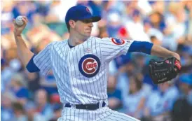  ?? | NAM Y. HUH/ AP ?? Cubs starting pitcher Kyle Hendricks won’t be able to pitch this weekend in Pittsburgh after his sore right hand appeared to worsen Tuesday.