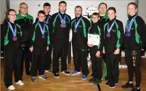  ??  ?? The club contingent after returning home from the world championsh­ips (from left): Rebecca Rowe, Patrick Monahan, Adam Tierney, Darren Hayes, Dale White (gold), Mark Rowe (gold), Nathan Casserley, Bobby O’Neill, Cathal Moran and Michelle Casserly.