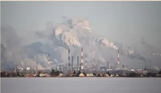  ?? (Alexey Malgavko/Reuters) ?? CONCERNS ABOUT the economic impact of climate change have escalated in recent years and pressure is mounting on business to accelerate the shift to a low-carbon economy. A view of the Gazprom Neft’s oil refinery in Omsk, Russia, earlier this month.