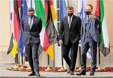  ?? (AFP) ?? L-R: UAE Foreign Minister Sheikh Abdullah bin Zayed al Nahyan, his Israeli counterpar­t Gabi Ashkenazi and German Foreign Minister Heiko Maas before their historic meeting at Villa Borsig in Berlin, Germany, on October 6