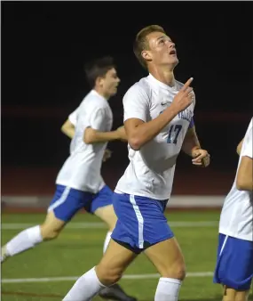  ?? PETE BANNAN — MEDIANEWS GROUP ?? Great Valley’s Nate McKay points skyward after scoring in the first half against West Chester East Tuesday.