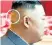  ??  ?? The mysterious plaster on the back of Kim Jong-un’s shaved head